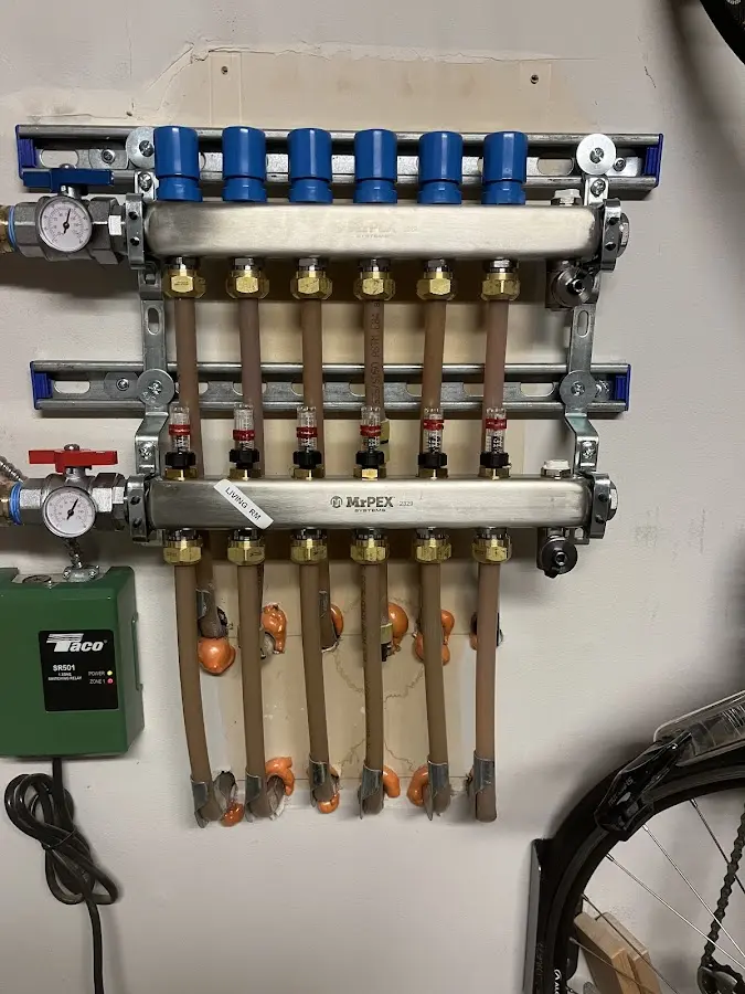 Plumber performing Leak Detection at a residential property in Benson